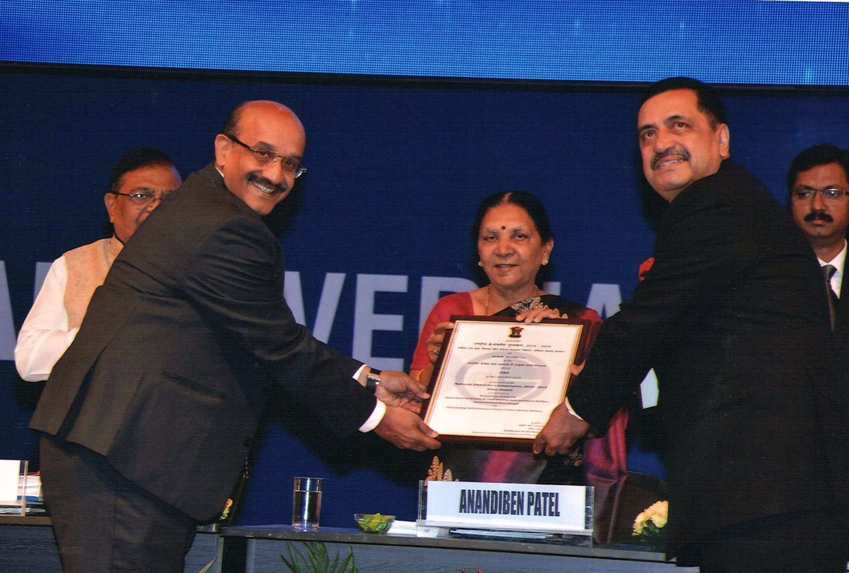 Receiving award as Chairman, Kushal Credai from Smt Anandiben Patel, CM of Gujarat